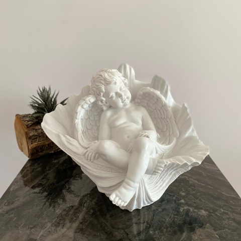 Midyede  Oturan Uyuyan Melek